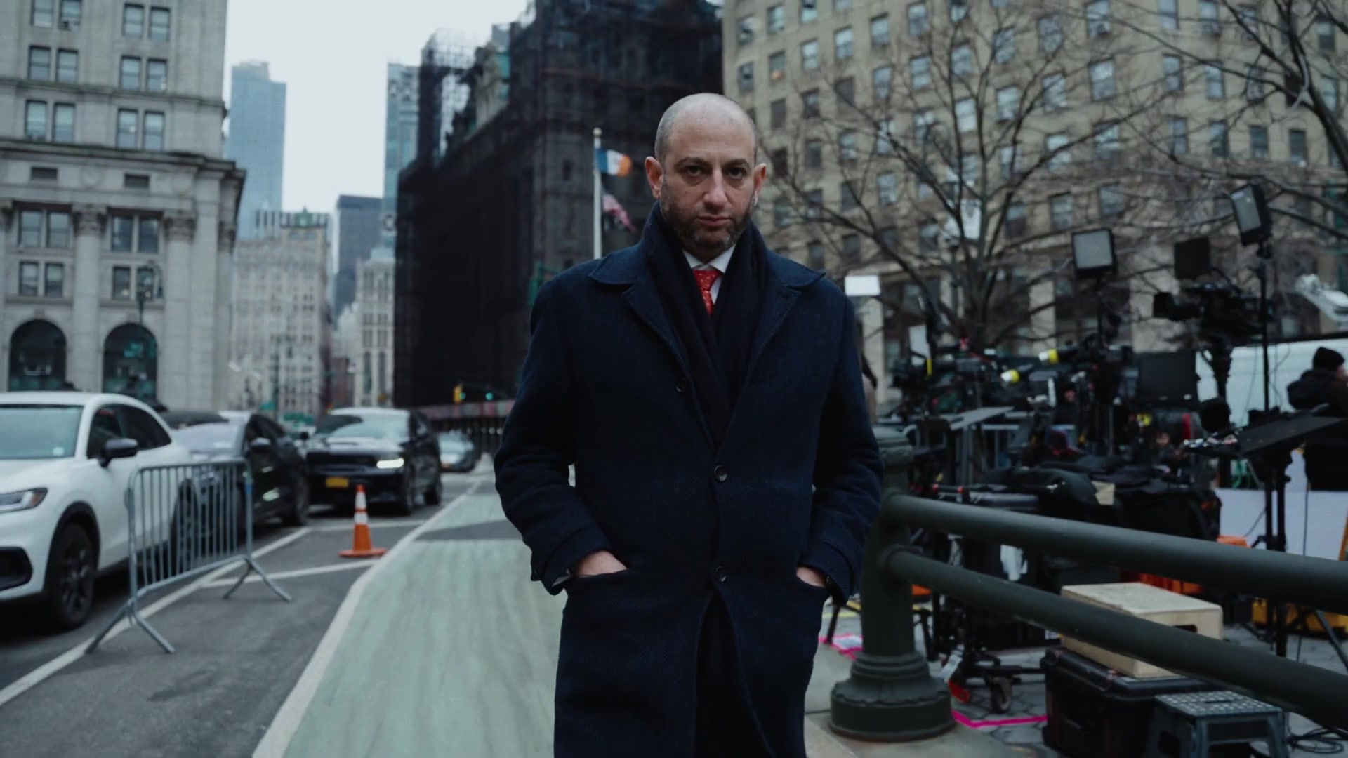 Todd Spodek outside courthouse with press cameras